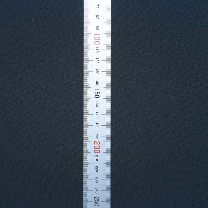 Close-up of the ARTISAN ZERO Black cloth weave with a measurement ruler